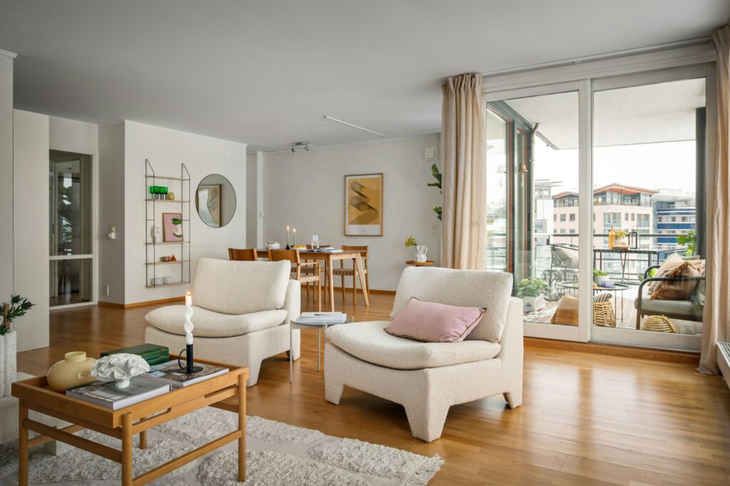 A living room filled with furniture and a fire place